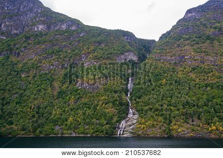 Geiranger fjord Beautiful Nature Norway. It is a 15-kilometre (9.3 mi) long branch off of the Sunnylvsfjorden which is a branch off of the Storfjorden (Great Fjord).