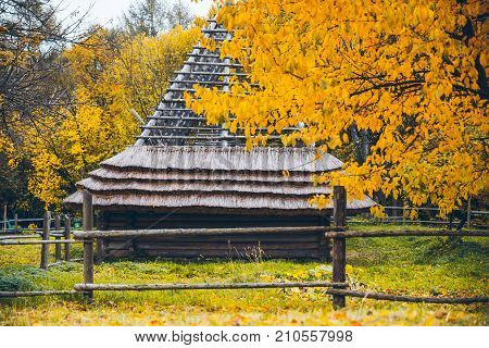 National Ukrainian houses in the mountains. Autumn in the Carpathians.