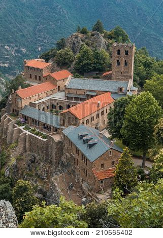 Top aerial view of the Romanesque Abbey of Saint Martin du Canigou in the French Pyrenees