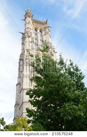 The Tower holy Jacques - Paris, France - Photo taken outdoor, of day and without character. Tourist place. The tower Saint Jacques is an isolated tower, built between 1509 and 1523, raised (drawn up) in the middle of the first Parisian public garden, whic