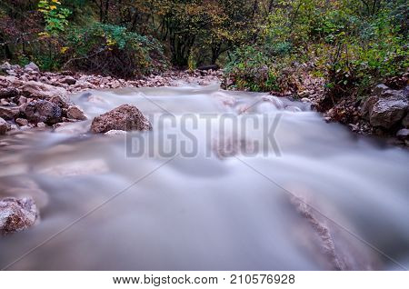 Beautiful river Vela Draga taken with long exposure in autumnn on the bottom of canyon Vela Draga, Croatia, HR
