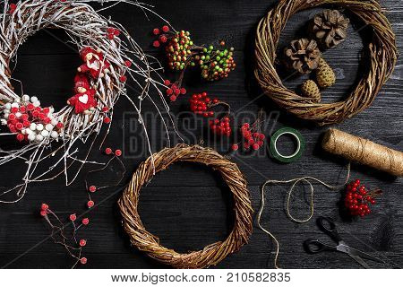 Make a Christmas wreath with your own hands. Workplace for preparing handmade decorations. Top view. Copy space. Still life. Flat lay