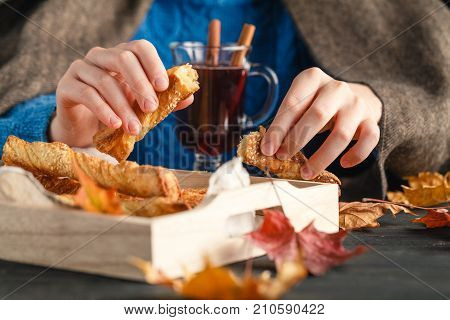 Girl In Plaid Eat Sweep Cokies, Seasoning Fall Leaves Around