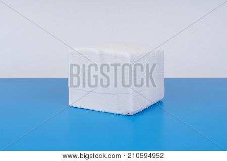 paper napkin isolated on white turquoise background.