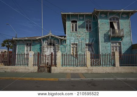 MEJILLONES, ANTOFAGASTA REGION, CHILE - SEPTEMBER 1, 2017: Historic building in the coastal city of Mejillones in the Antofagasta Region of Chile.