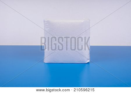 paper napkin isolated on white turquoise background.