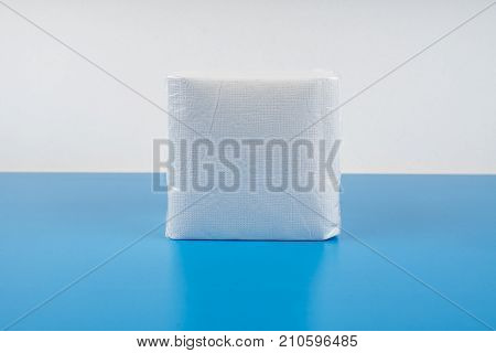 paper napkin isolated on white turquoise background.