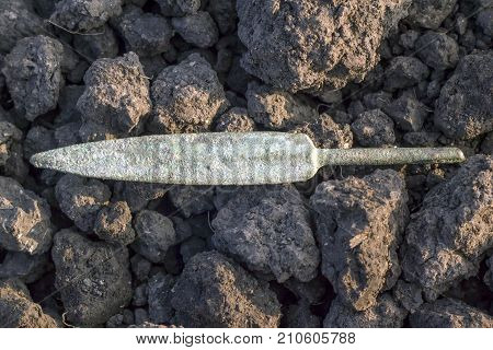 Scythian arrowhead, archeological findings, scythian arrowhead on soil