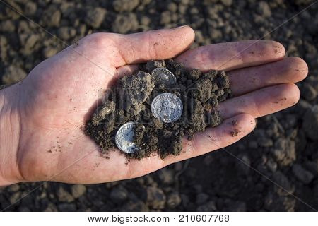 Hand Holding Roman Denarius (roman Silver Coin)