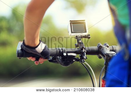 young woman cyclist cycling mountain bike outdoor