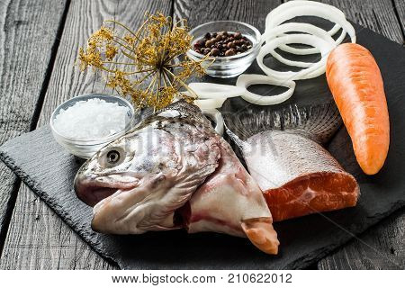 Ingredients for fish broth: head and tail of salmon onion pepper carrots salt bay leaf dill umbrella. Dietary and healthy food