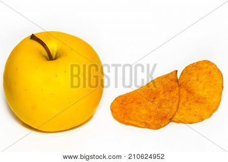 Potato Chips And An Apple,the Concept Of Choosing The Right Food, Isolated On White Background
