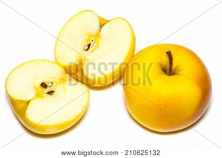 Ripe Yellow Apple Fruit And Apple Half Isolated On White Background