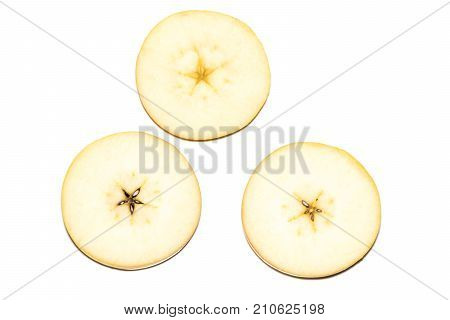 Slice of yellow apple fruit isolated on white background.