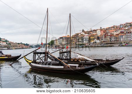 Porto, Portugal - July, 2017. Porto, Portugal Old Town Cityscape On The Douro River With Traditional