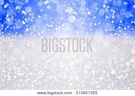 Abstract blue white and silver glitter sparkle background or confetti party invite for wedding, birthday, Christmas, Hanukkah, Jewish Chanukah, Israel Independence Day or winter snow