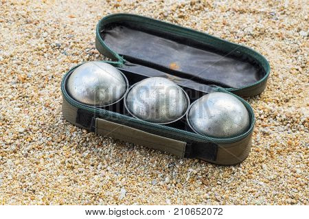 petanque ball set in the bag on the field with nobody.