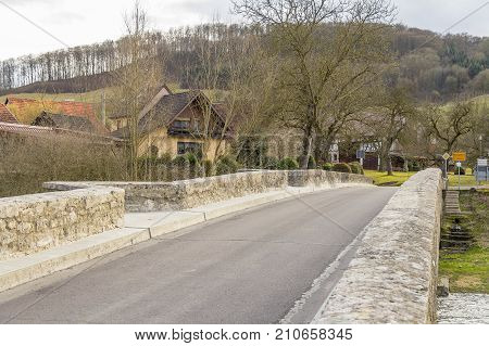 historic stone bridge at a small rural village named Oberregenbach near Langenburg in Hohenlohe a area in Southern Germany