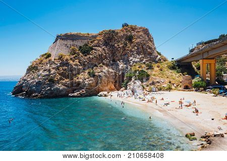 Crete Palaiokastro June 10 2017: People have a rest at sea bay of Palaiokastro town with beautiful beach on Crete island Greece