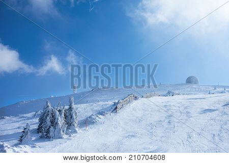 Ski slope on a sunny day in ski resort Kopaonik, Serbia