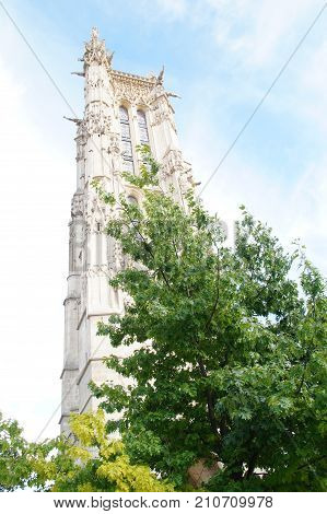 The tower Saint Jacques - Paris, France - Photo taken outdoor, without character, outside - The tower Saint Jacques is an isolated tower, built between 1509 and 1523, raised (drawn up) in the middle of the first Parisian public garden, which bears its nam