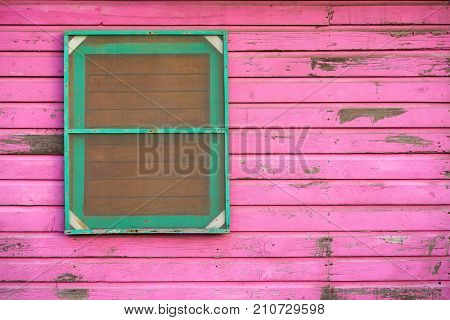 Mahahual Caribbean grunge pink wood painted wall in Costa Maya Mexico