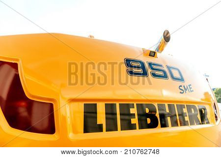 PARIS FRANCE - SEP 5 2019: Rear view of a Liebherr 950 sme excavator on a construction site