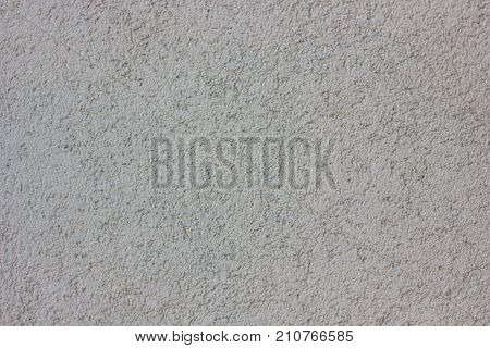 Concrete wall texture. Wheathered plaster background grey color