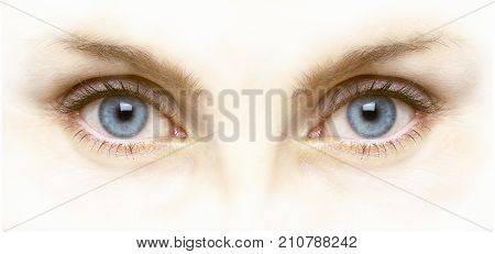 CLOSE UP OF FEMALE WITH BLUE EYES