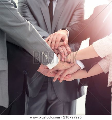 success concept collaboration: a friendly business team put thei