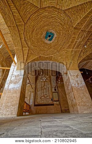 NAIN, IRAN - MAY 6, 2015: Arcade hall of the old Jame mosque in Iran.