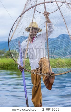 INLE LAKE MYANMAR - SEP 07 : Burmese fisherman at Inle lake Myanmar on September 07 2017 inle Lake is a freshwater lake located in Shan state