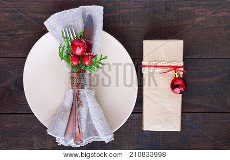 Christmas table decoration. Christmas dinner plate cutlery decorated festive decorations. Winter holidays. Christmas card. Free space for your text. Merry Christmas Happy New Year.