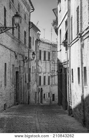 Montecassiano (Macerata Marches Italy) old buildings in the historic town. Black and white