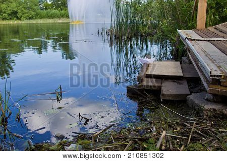 Fountain On The River In The Summer. The River Sviyaga, Ulyanovsk, Russia.