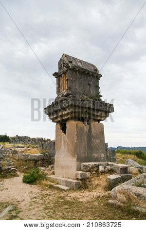 Vertical Shot Of Ancient Tomb In Xantos - Lycian Capital Located In Antalya Province In Turkey