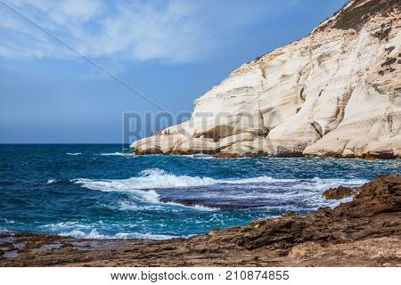 Geological phenomenon in the north of Israel. The grottoes of Rosh Ha Nikra. Rocks of white limestone on the shores of the Mediterranean Sea