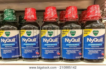 New York October 23 2017: NyQuil bottles stand on a store shelf.