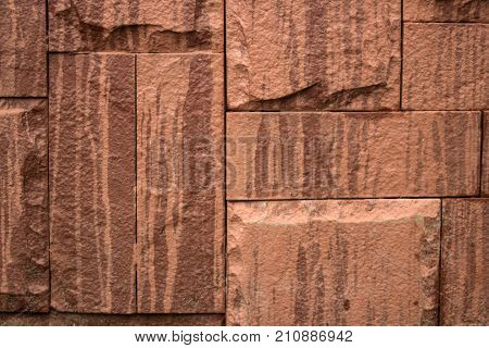 Stone wall texture rock background. red stone