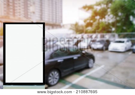 mock up of blank showcase billboard or advertising light box for your text message or media content with car in the parking lot in row commercial marketing and advertising concept