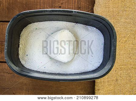 blue colored jeans and laundry detergent pictures
washing with blue jeans and laundry detergent
a scale laundry detergent,