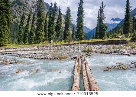Bridge Over The River In Karakol National Park