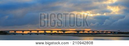 long bridge across the bay , architectural monument, connecting shores