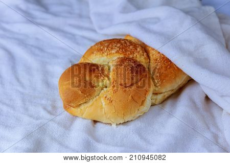 Shabbat Or Sabbath Kiddush Ceremony Composition With A Traditional Sweet Fresh Loaf Of Challah Bread