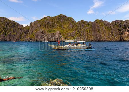 - A Typical Philippine Boat Carrying Tourists To Discover The Bacuit Archipelago In Palawan