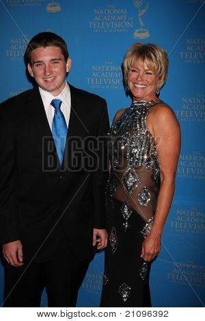 LOS ANGELES - JUN 17:  Austin Michael Luciano, Judi Evans arrive at the 38th Annual Daytime Creative Arts & Entertainment Emmy Awards at Westin Bonaventure Hotel on June 17, 2011 in Los Angeles, CA