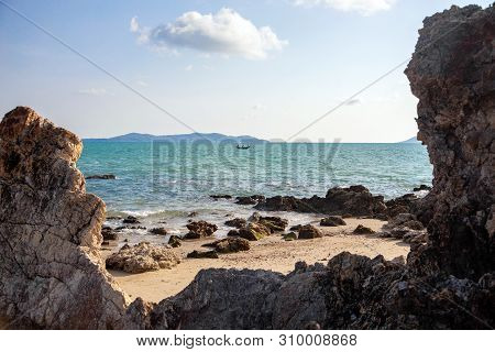 Fisherman Boat On Rock Frame From Nature Island