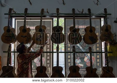 Gianyar,bali/indonesia-may 30 2019: I Wayan Tuges, The Owner Of The Tuges And Blueberry Carving Guit