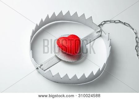 Trap With Heart. Love Is Like Bait. Gray Background