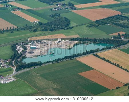 Gravel Pit With Pond - Aerial View - Commercial Gravel And Sand Quarry - Gravel Industry